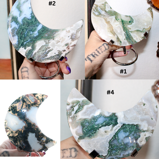 Collection of green and white moss agate stone crescent moon-shaped decorations with numbers indicating variations.