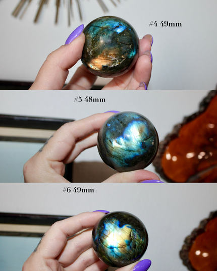Three views of a labradorite crystal ball held by a hand with purple nail polish.