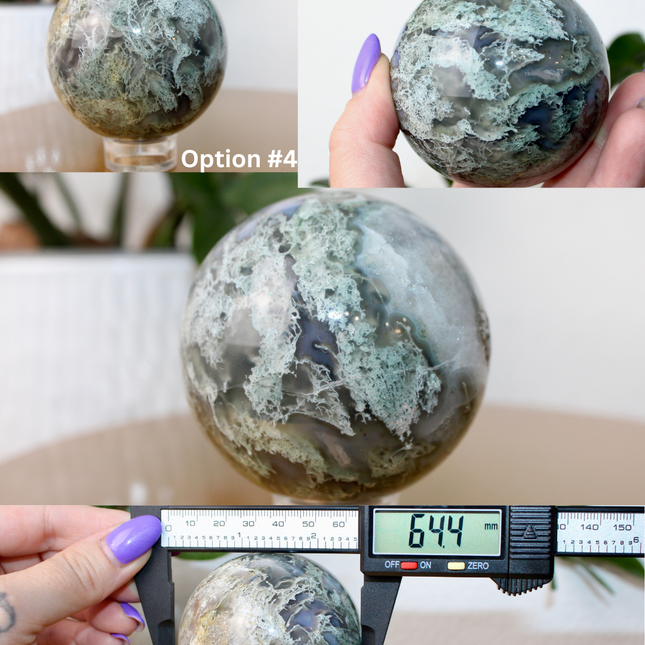 This XL Moss Agate Sphere features a stunning mix of natural green inclusions and cloudy white tones, reminiscent of forest landscapes or underwater gardens. Each sphere is one of a kind, with swirling patterns and depth that make it a true conversation piece.