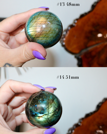 Two images showing a hand holding a labradorite crystal ball with measurements below.