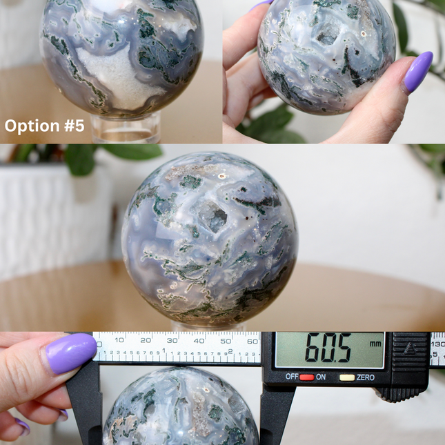 This XL Moss Agate Sphere features a stunning mix of natural green inclusions and cloudy white tones, reminiscent of forest landscapes or underwater gardens. Each sphere is one of a kind, with swirling patterns and depth that make it a true conversation piece.