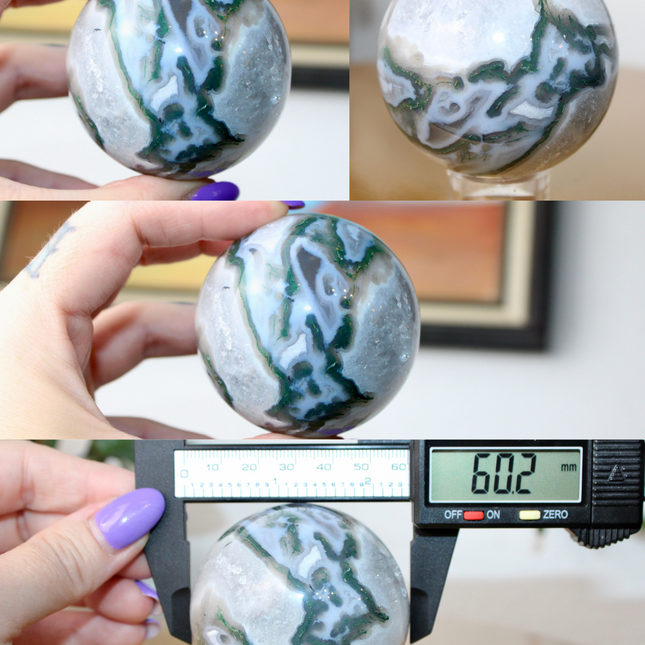 This XL Moss Agate Sphere features a stunning mix of natural green inclusions and cloudy white tones, reminiscent of forest landscapes or underwater gardens. Each sphere is one of a kind, with swirling patterns and depth that make it a true conversation piece.