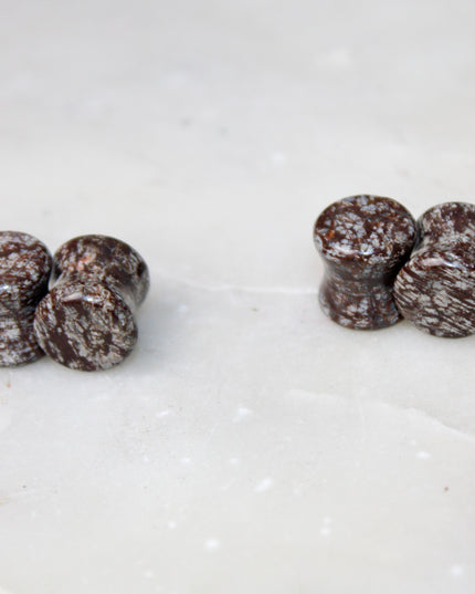 These Double Flare Brown Snowflake Obsidian Plugs bring together natural stone beauty and meaningful energy—perfect for everyday wear, spiritual practice, or anyone seeking balance with a striking, earthy edge.