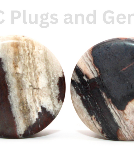 These African Zebra Stone Double Flare Plugs bring together bold pattern and crystal grounding energy—perfect for stretched ears seeking a look that’s as strong and centered as it is unique.