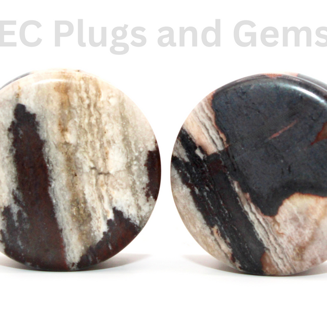 These African Zebra Stone Double Flare Plugs bring together bold pattern and crystal grounding energy—perfect for stretched ears seeking a look that’s as strong and centered as it is unique.