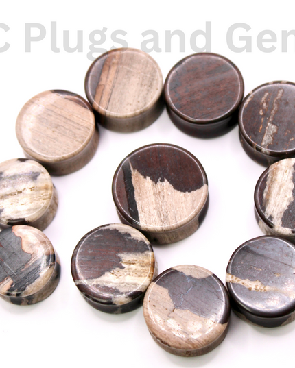 These African Zebra Stone Double Flare Plugs bring together bold pattern and crystal grounding energy—perfect for stretched ears seeking a look that’s as strong and centered as it is unique.