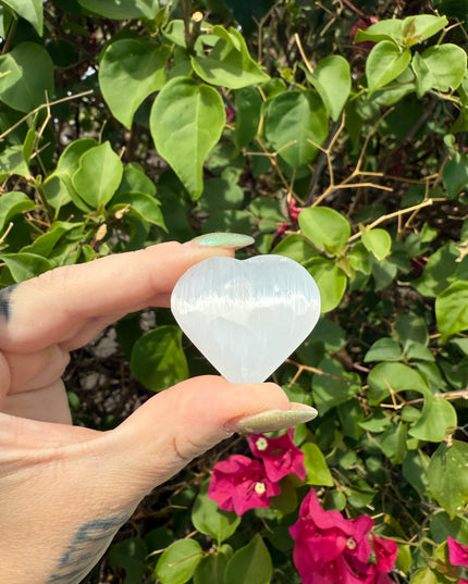 Bring calm, clarity, and loving energy into your life with this beautifully polished 30mm Selenite Heart. Carved from genuine selenite, this heart-shaped crystal is perfect for energy cleansing, emotional healing, and amplifying peaceful vibes in any space.