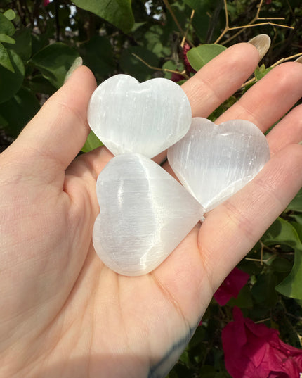 Bring calm, clarity, and loving energy into your life with this beautifully polished 30mm Selenite Heart. Carved from genuine selenite, this heart-shaped crystal is perfect for energy cleansing, emotional healing, and amplifying peaceful vibes in any space.