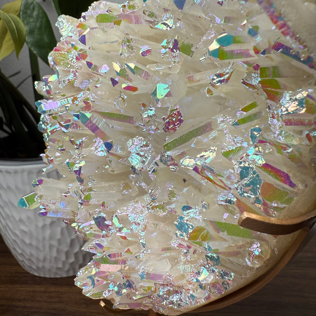 These Electroplated Aura Quartz Hearts combine the universal symbol of love with brilliant color and energy—set beautifully on a metal stand for easy display. Whether you're building your altar, brightening a room, or gifting crystal magic, pick the piece that sparks your spirit.