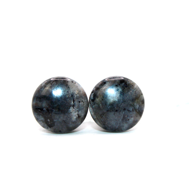 These single flare plugs are crafted from genuine Larvikite, often called Black Labradorite, and feature a dark, elegant appearance with natural silver or blue reflective flash. Each plug is polished to a smooth finish for comfort and style.