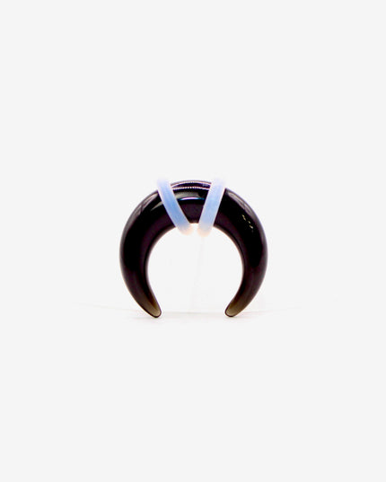 This Obsidian Septum Pincher is carved from genuine volcanic glass and polished to a smooth, glossy finish.
