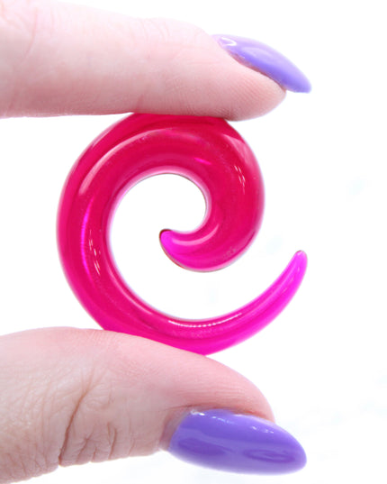 These Purple Acrylic Spiral Taper Earrings are a stylish and low-maintenance option for stretched ears. The sleek spiral design adds visual interest while remaining lightweight and easy to wear. Perfect for everyday use or to enhance your alt aesthetic, these tapers offer a bold yet classic look.