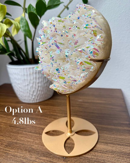These Electroplated Aura Quartz Hearts combine the universal symbol of love with brilliant color and energy—set beautifully on a metal stand for easy display. Whether you're building your altar, brightening a room, or gifting crystal magic, pick the piece that sparks your spirit.