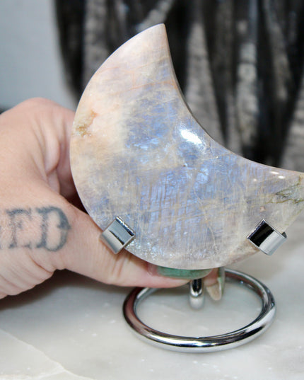 This Rainbow Moonstone Moon on a Stand is a stunning blend of celestial symbolism and crystal magic. Whether used in meditation, energy work, or simply as a glowing accent, it invites serenity, inspiration, and moonlit wisdom into your space.