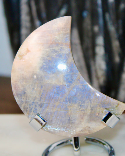 This Rainbow Moonstone Moon on a Stand is a stunning blend of celestial symbolism and crystal magic. Whether used in meditation, energy work, or simply as a glowing accent, it invites serenity, inspiration, and moonlit wisdom into your space.