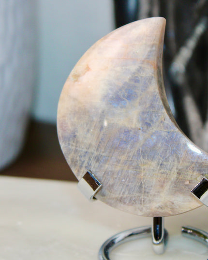 This Rainbow Moonstone Moon on a Stand is a stunning blend of celestial symbolism and crystal magic. Whether used in meditation, energy work, or simply as a glowing accent, it invites serenity, inspiration, and moonlit wisdom into your space.