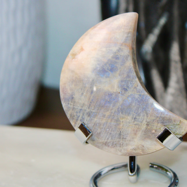 This Rainbow Moonstone Moon on a Stand is a stunning blend of celestial symbolism and crystal magic. Whether used in meditation, energy work, or simply as a glowing accent, it invites serenity, inspiration, and moonlit wisdom into your space.