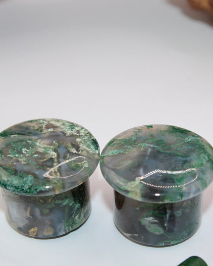 These Grade A Moss Agate Single Flare Plugs offer both comfort and crystal energy in one elegant pair. Ideal for nature lovers, energy workers, or anyone who appreciates the earthy charm of natural stone jewelry.