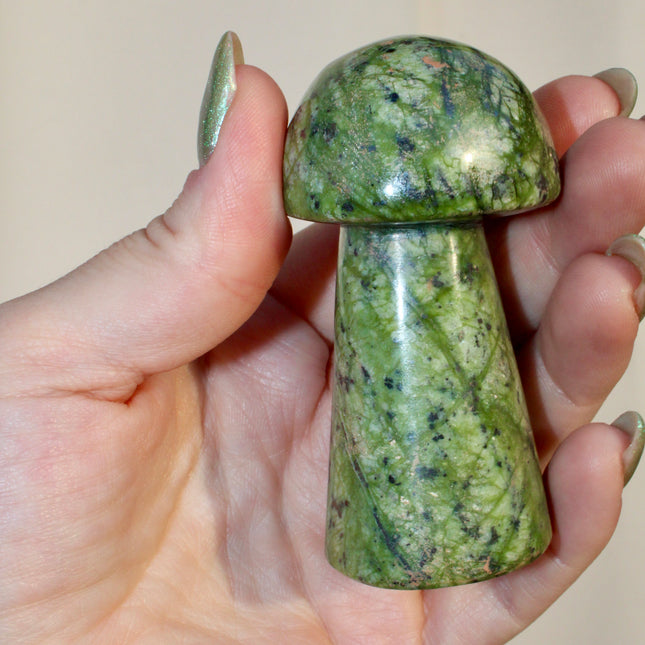 Bring a touch of nature’s magic into your space with this hand-carved Green Serpentine mushroom. With its soft to rich green hues and earthy marbling, this crystal piece is perfect for altars, terrariums, crystal grids, or display. Symbolizing growth, grounding, and a deep connection to the earth, it makes a meaningful gift for collectors and enthusiasts alike.