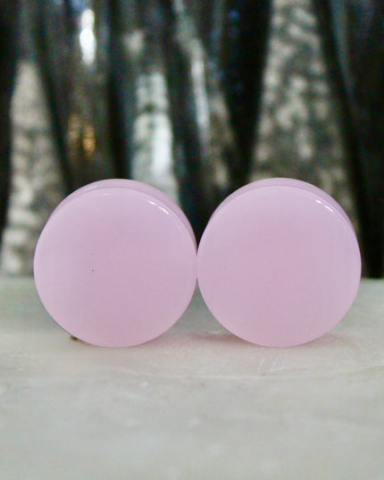 These Pink Agate Double Flare Plugs combine crystal healing with bold color and natural elegance—perfect for everyday wear or adding a soft, grounding energy to your stretched ear style.