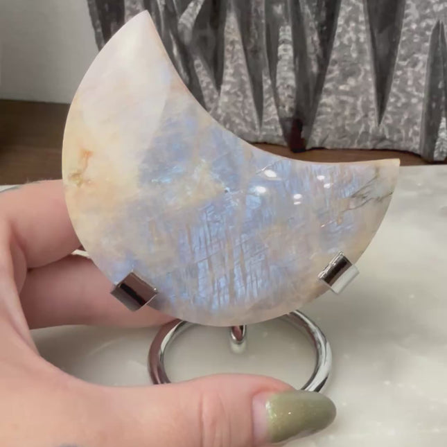 This Rainbow Moonstone Moon on a Stand is a stunning blend of celestial symbolism and crystal magic. Whether used in meditation, energy work, or simply as a glowing accent, it invites serenity, inspiration, and moonlit wisdom into your space.