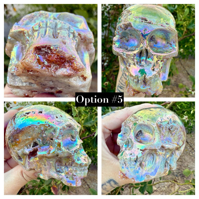 A mesmerizing Genuine Quartz Skull Carving with Rainbow Aura Treatment glows with an ethereal spectrum of colors, resting against a dark, reflective surface. The quartz base is expertly carved into a detailed skull, complete with defined features and a polished finish. The surface shimmers with iridescent hues—vivid blues, purples, pinks, and golds—created through the rainbow aura treatment, a process that bonds precious metals to the quartz for a permanent, luminous effect.