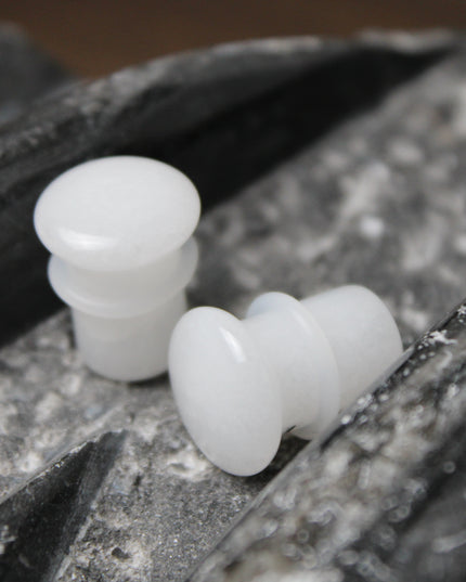 These White Quartz Single Flared Plugs combine subtle beauty with soothing energy—ideal for anyone seeking a minimalist look with meaningful crystal benefits.