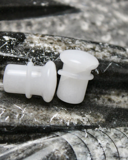 These White Quartz Single Flared Plugs combine subtle beauty with soothing energy—ideal for anyone seeking a minimalist look with meaningful crystal benefits.