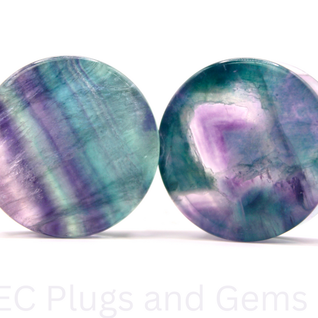 Rainbow Fluorite Double Flare Plugs and gemstones on a white background with 'EC Plugs and Gems' text.