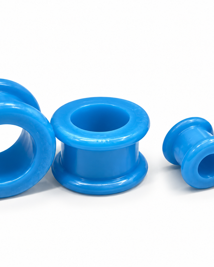 Four bright blue silicone ear plugs in various sizes, arranged on a clean white background.