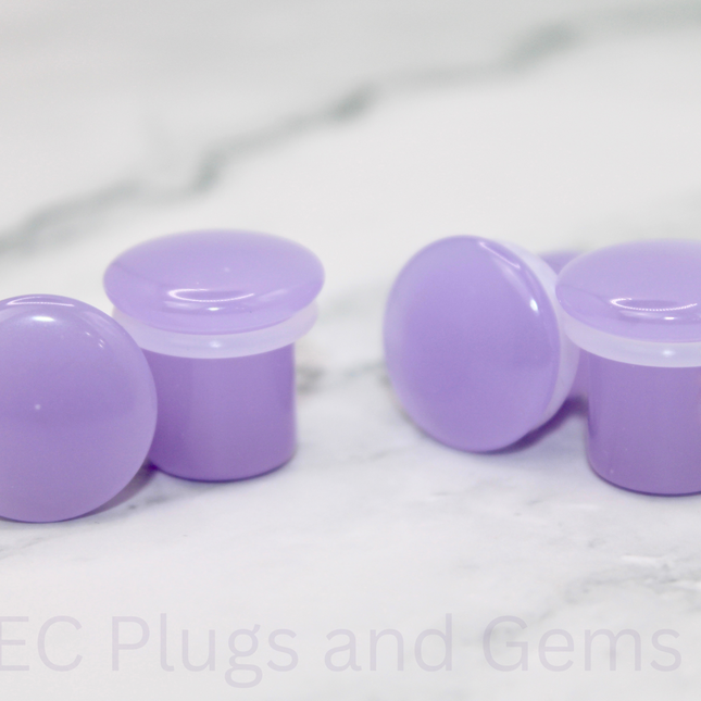 These Violet Opalite Single Flare Plugs are perfect for adding a touch of soft magic to your stretched ears—ideal for everyday wear, spiritual expression, or pastel-inspired styles.