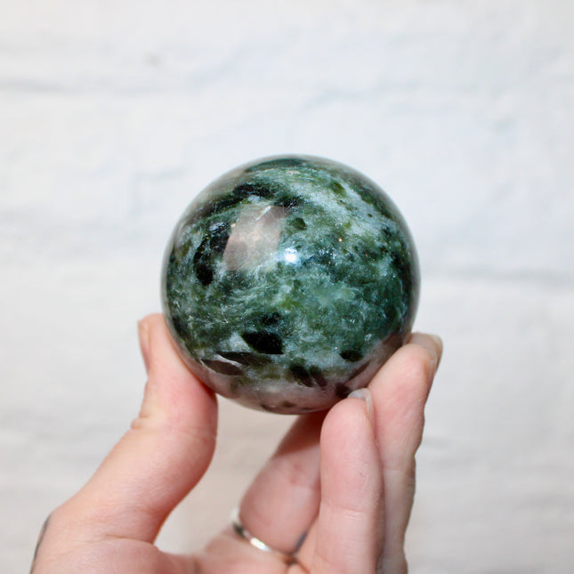 Green Tourmaline in Quartz Sphere - 57mm Stone Sphere with Plastic Display Stand Included - Green, White, and Black Stone Ball