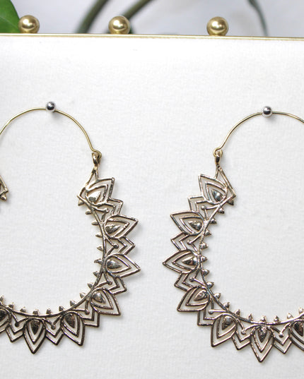 Elevate your stretched ear style with these stunning handmade gold brass ear weights, inspired by traditional Indian tribal mandala art. Crafted with care, each piece showcases intricate mandala detailing that adds a bold, spiritual elegance to any look.