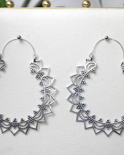 Elevate your stretched ear style with these stunning handmade silver brass ear weights, inspired by traditional Indian tribal mandala art. Crafted with care, each piece showcases intricate mandala detailing that adds a bold, spiritual elegance to any look.