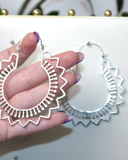 Elevate your stretched ear style with these stunning handmade silver brass ear weights, inspired by traditional Indian tribal mandala art. Crafted with care, each piece showcases intricate mandala detailing that adds a bold, spiritual elegance to any look.