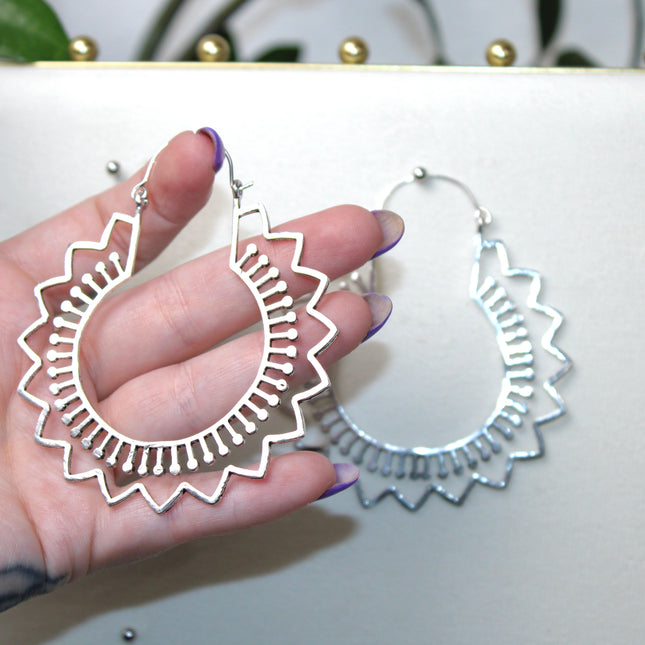 Elevate your stretched ear style with these stunning handmade silver brass ear weights, inspired by traditional Indian tribal mandala art. Crafted with care, each piece showcases intricate mandala detailing that adds a bold, spiritual elegance to any look.