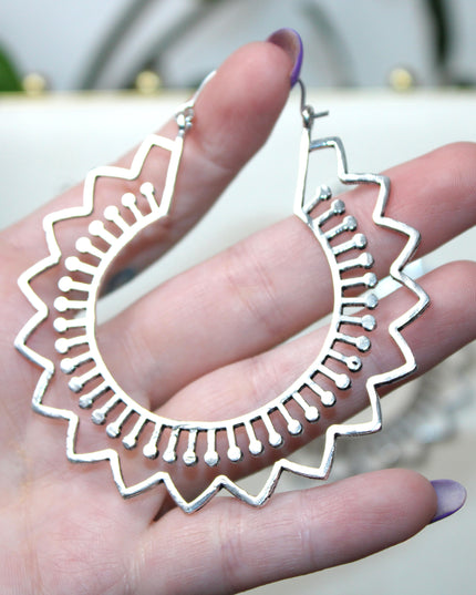Elevate your stretched ear style with these stunning handmade silver brass ear weights, inspired by traditional Indian tribal mandala art. Crafted with care, each piece showcases intricate mandala detailing that adds a bold, spiritual elegance to any look.