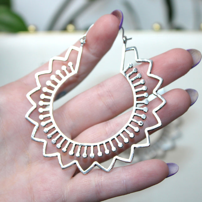 Elevate your stretched ear style with these stunning handmade silver brass ear weights, inspired by traditional Indian tribal mandala art. Crafted with care, each piece showcases intricate mandala detailing that adds a bold, spiritual elegance to any look.