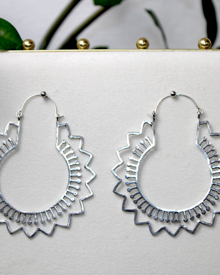 Elevate your stretched ear style with these stunning handmade silver brass ear weights, inspired by traditional Indian tribal mandala art. Crafted with care, each piece showcases intricate mandala detailing that adds a bold, spiritual elegance to any look.