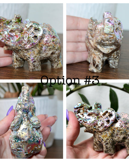 This Aura Quartz Elephant Carving features a charming hand-carved design enhanced with a brilliant rainbow electroplated finish. Made from natural quartz and treated to produce a luminous, color-shifting surface, this figurine blends natural beauty with a playful, eye-catching twist.