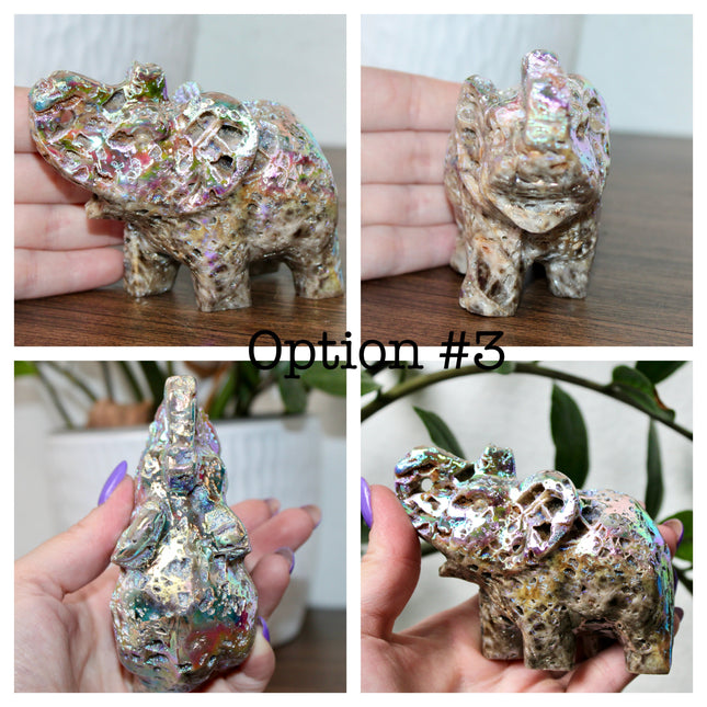 This Aura Quartz Elephant Carving features a charming hand-carved design enhanced with a brilliant rainbow electroplated finish. Made from natural quartz and treated to produce a luminous, color-shifting surface, this figurine blends natural beauty with a playful, eye-catching twist.
