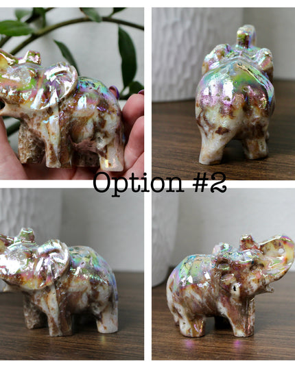 This Aura Quartz Elephant Carving features a charming hand-carved design enhanced with a brilliant rainbow electroplated finish. Made from natural quartz and treated to produce a luminous, color-shifting surface, this figurine blends natural beauty with a playful, eye-catching twist.