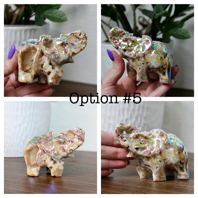 This Aura Quartz Elephant Carving features a charming hand-carved design enhanced with a brilliant rainbow electroplated finish. Made from natural quartz and treated to produce a luminous, color-shifting surface, this figurine blends natural beauty with a playful, eye-catching twist.