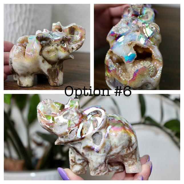 This Aura Quartz Elephant Carving features a charming hand-carved design enhanced with a brilliant rainbow electroplated finish. Made from natural quartz and treated to produce a luminous, color-shifting surface, this figurine blends natural beauty with a playful, eye-catching twist.