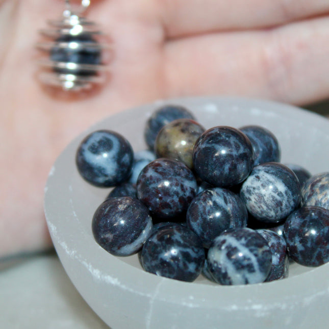 This Spiral Cage Crystal Sphere Necklace offers both beauty and function—allowing you to change out crystal spheres based on your energy or intention for the day. Whether you're seeking clarity, protection, calm, or empowerment, there’s a stone to support your journey.