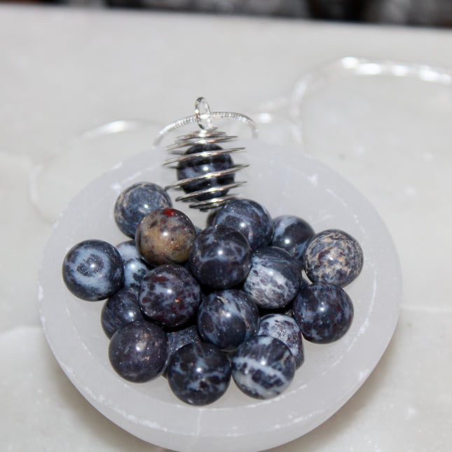 This Spiral Cage Crystal Sphere Necklace offers both beauty and function—allowing you to change out crystal spheres based on your energy or intention for the day. Whether you're seeking clarity, protection, calm, or empowerment, there’s a stone to support your journey.