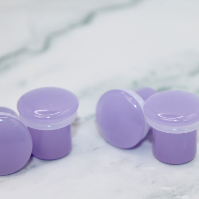These Violet Opalite Single Flare Plugs are perfect for adding a touch of soft magic to your stretched ears—ideal for everyday wear, spiritual expression, or pastel-inspired styles.