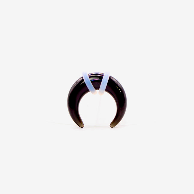 This Obsidian Septum Pincher is carved from genuine volcanic glass and polished to a smooth, glossy finish.