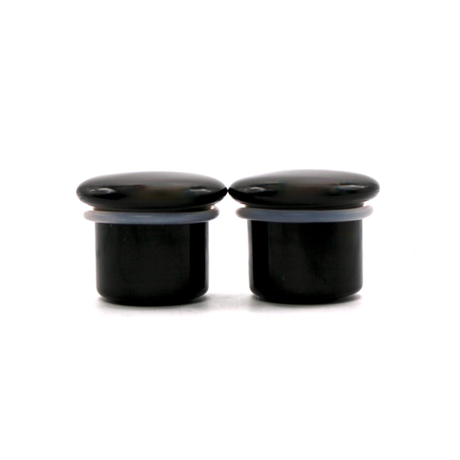 These Black Obsidian Single Flare Plugs are carved from genuine volcanic glass and polished for a bold, minimalist look. The secure single flare design with O-rings ensures comfortable, everyday wear for stretched lobes.