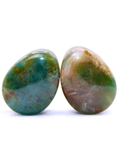 These Moss Agate Tear Drop Plugs are hand-carved from genuine moss agate, showcasing unique green hues and natural, moss-like patterns within the stone. The tear drop shape offers a stylish alternative to traditional round plugs, and the double flare design ensures a secure, comfortable fit without the need for O-rings.